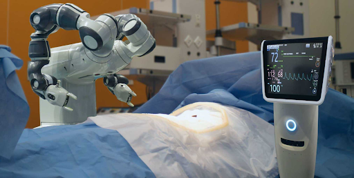 Robotic arms performing surgery with a digital monitor displaying patient vitals in a high-tech operating room.